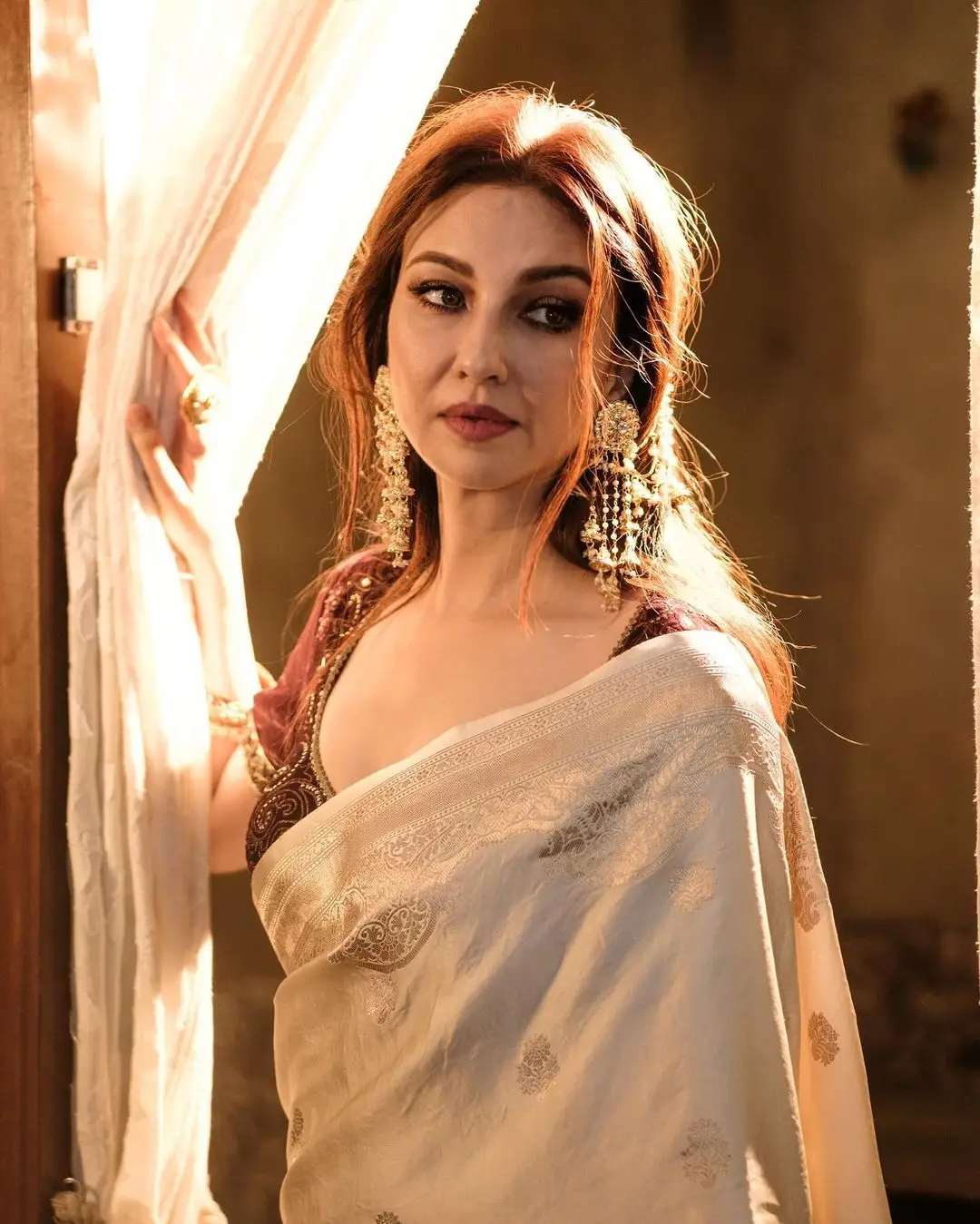 Bollywood Actress Saumya Tandon in White Saree